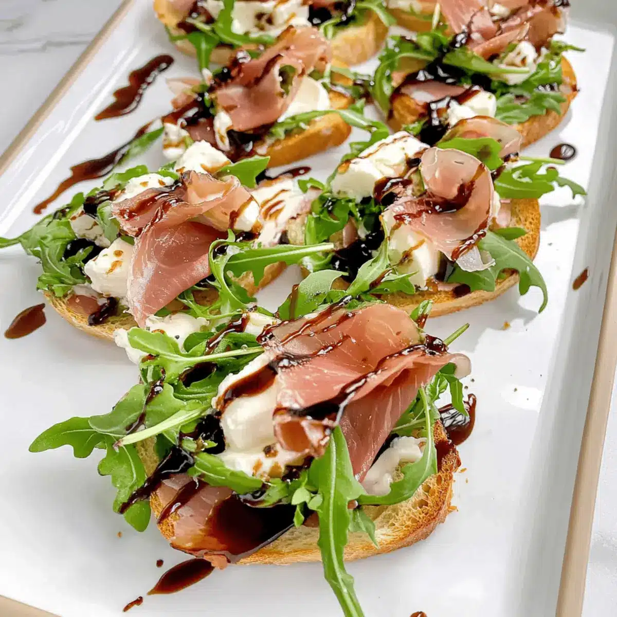 Boursin Prosciutto Arugula Crostini f9gfsf
